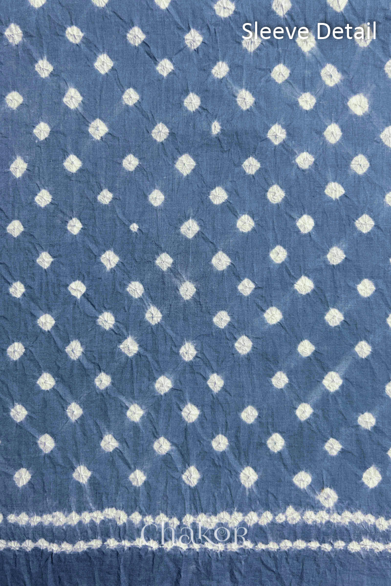 Bandhani dotted sleeve pattern on mercerised cotton fabric with handcrafted tie dye work.
