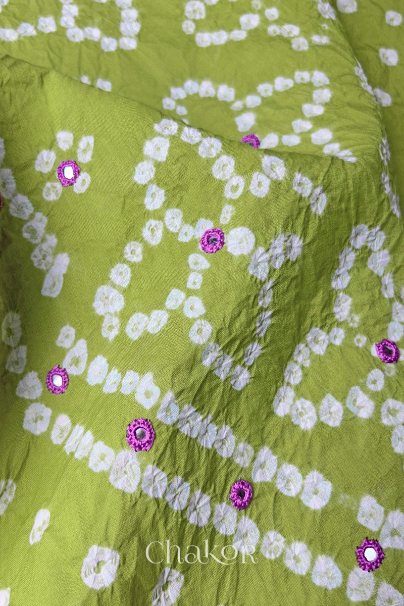 Back yoke detail featuring traditional Bandhani floral motifs on Green cotton fabric.
