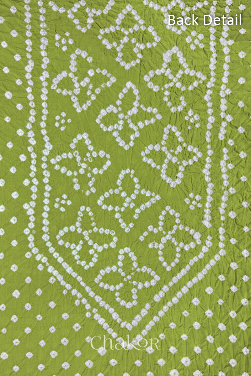 Bandhani dotted sleeve pattern on mercerised cotton fabric with handcrafted tie dye work.
