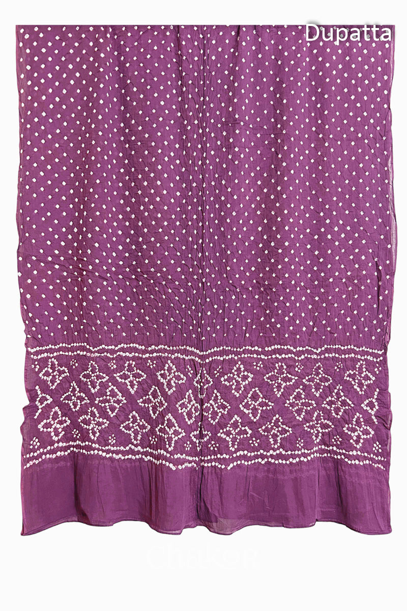 Full view of Mauve Bandhani mulmul cotton dupatta with floral pallu and dotted body pattern.
