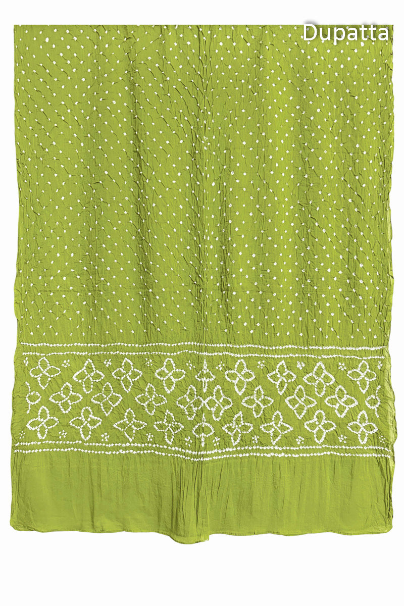 Full view of Lime Green Bandhani mulmul cotton dupatta with floral pallu and dotted body pattern.
