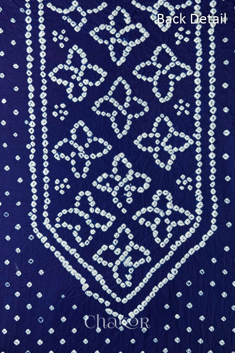 Back yoke detail featuring traditional Bandhani floral motifs on Navy Blue cotton fabric.
