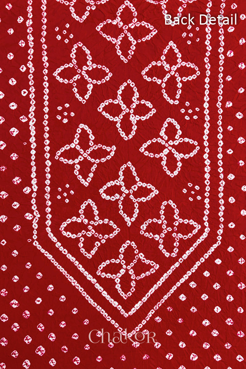 Close-up of Bandhani floral pattern accented with hand embroidered mirror work.
