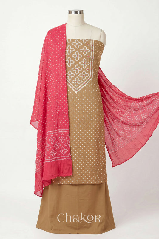 Beige Kutch Bandhani cotton unstitched suit set, mirror work kurta with Coral pink mulmul cotton dupatta.

