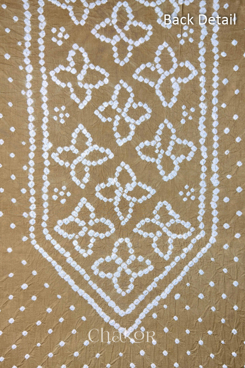 Back yoke detail featuring traditional Bandhani floral motifs on Beige cotton fabric.

