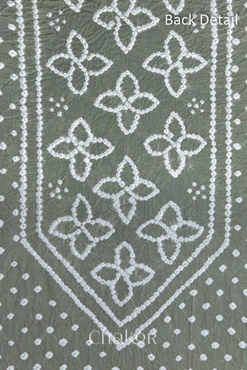 Back yoke detail featuring traditional Bandhani floral motifs on Grey cotton fabric.
