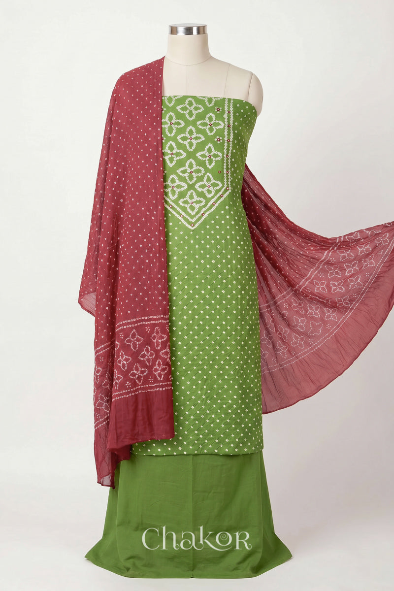 Green Kutch Bandhani cotton unstitched suit set, mirror work kurta with Dusty Red mulmul cotton dupatta.
