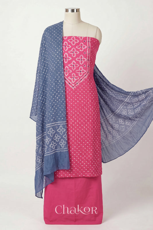 Pink Kutch Bandhani cotton unstitched suit set, mirror work kurta with Grey mulmul cotton dupatta.
