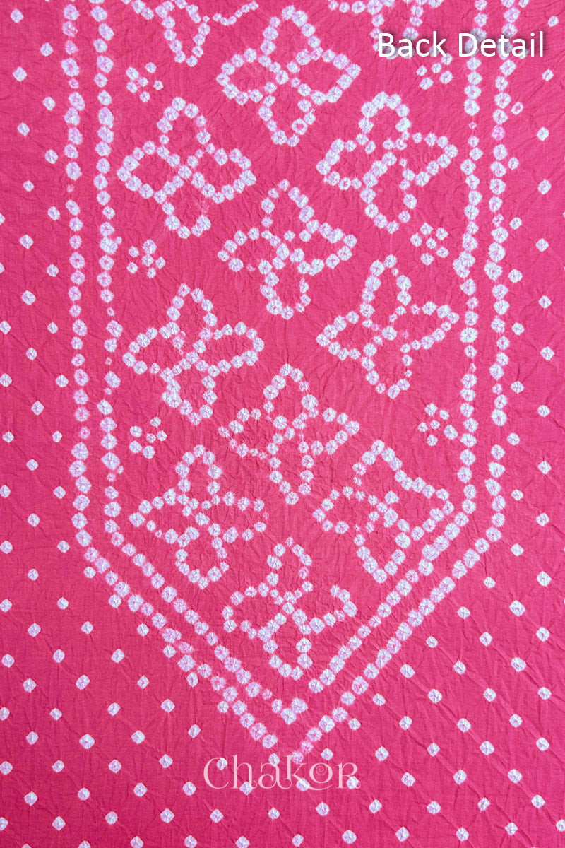 Back yoke detail featuring traditional Bandhani floral motifs on Pink cotton fabric.
