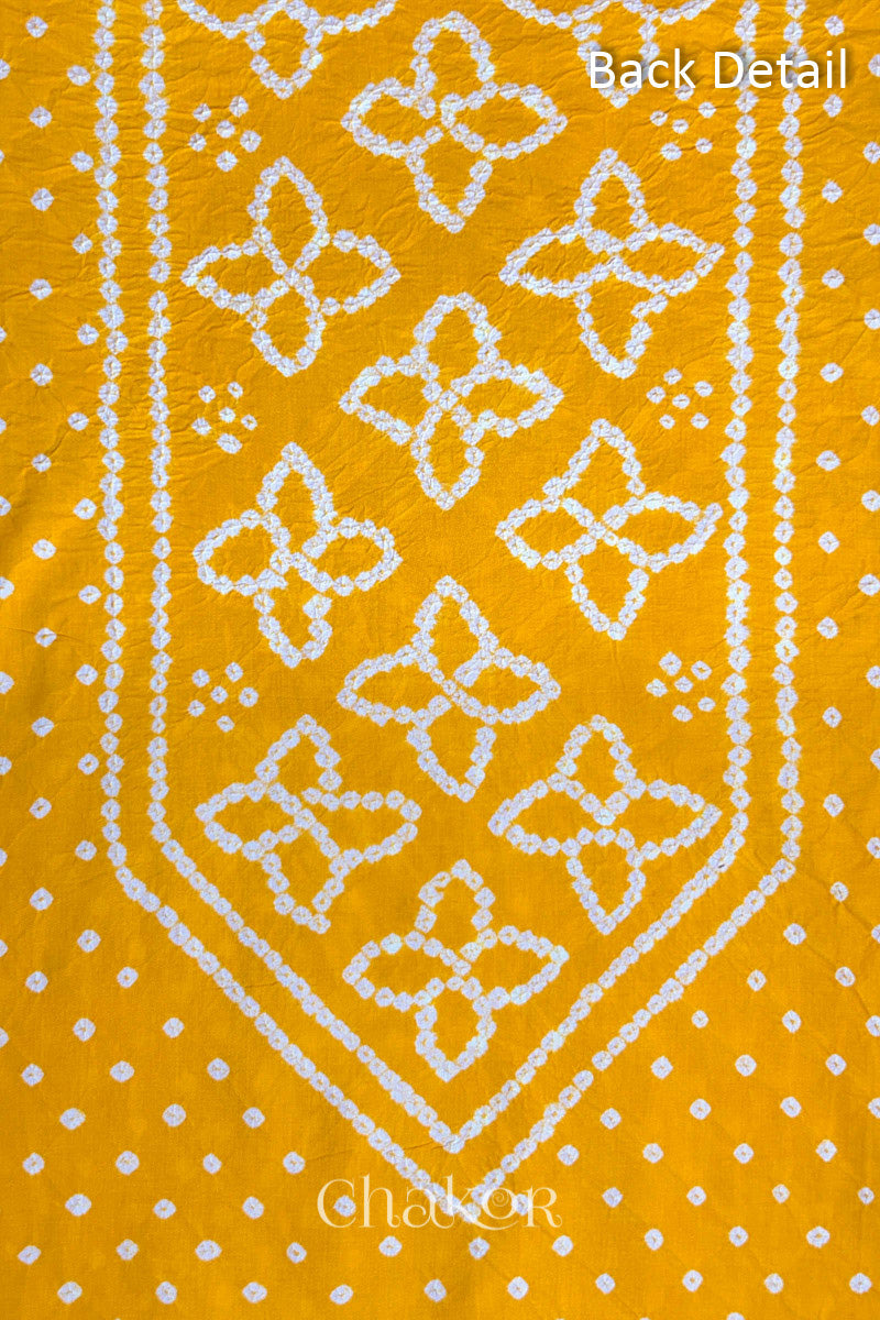 Back yoke detail featuring traditional Bandhani floral motifs on Yellow cotton fabric.

