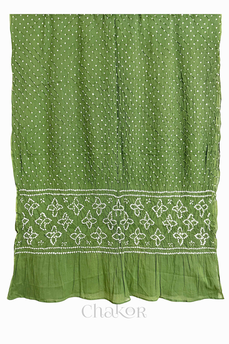 Full view of Green Bandhani mulmul cotton dupatta with floral pallu and dotted body pattern.
