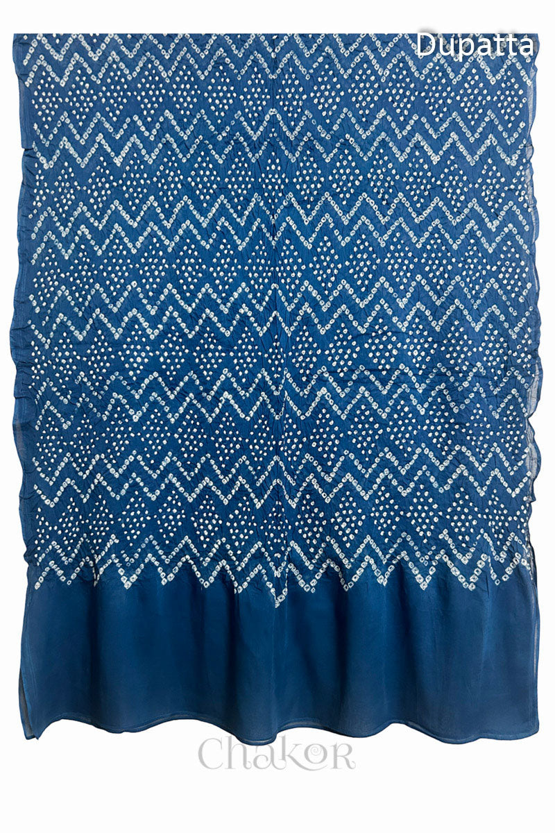 Full view of the indigo blue dupatta from the kurta set with intricate zigzag bandhani patterns, with Chakor watermark. The design showcases artisanal craftsmanship.
