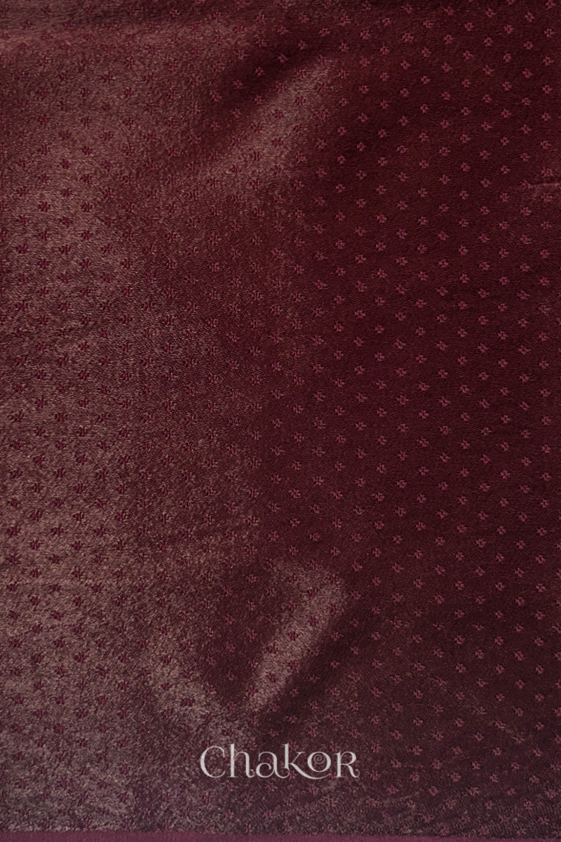 maroon mashru self textured fabric with 'Chakor' logo visible.
