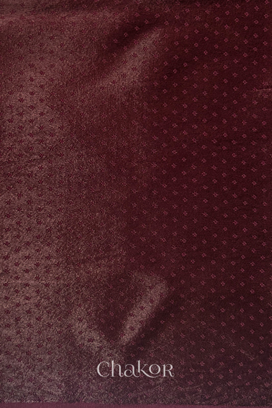 maroon mashru self textured fabric with 'Chakor' logo visible.
