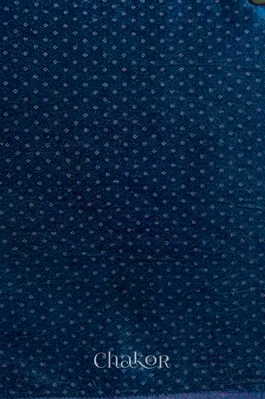 Navy mashru self textured fabric with 'Chakor' logo visible.