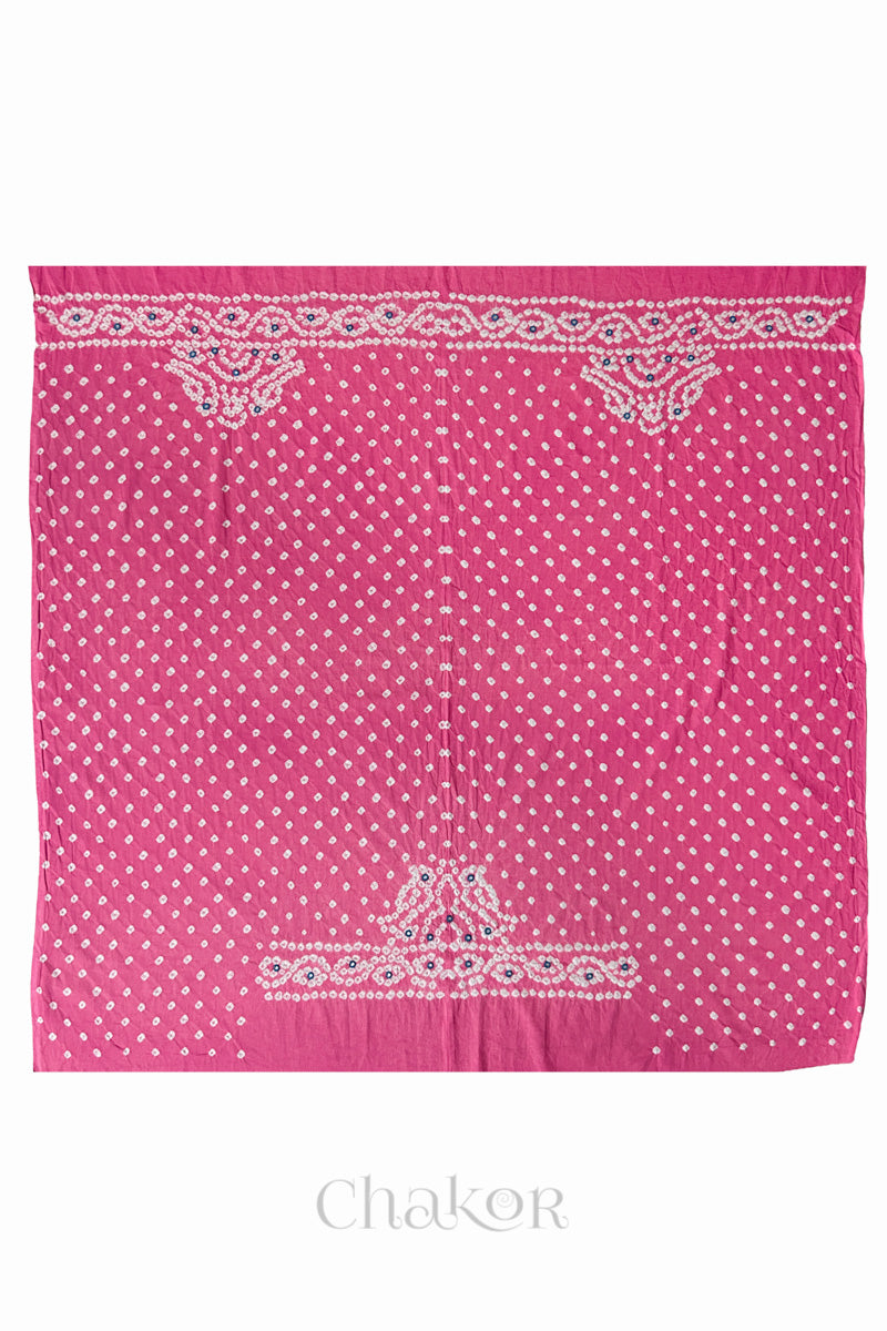 Full 1-metre layout of Pink Popat Bandhani blouse piece showing back and sleeve motif placement.
