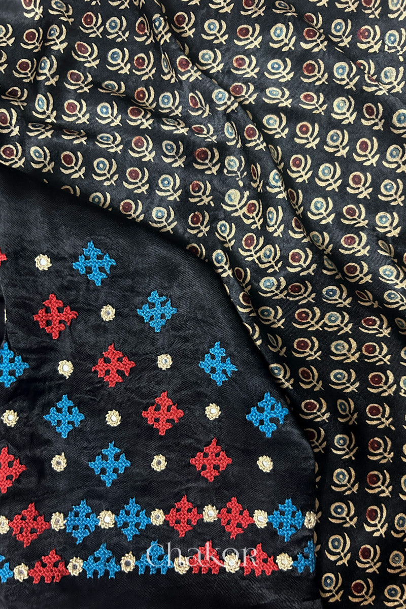 Natural dyed black Ajrakh printed Mashru silk-cotton blouse material with  Traditional Kutch hand embroidery and mirror work.