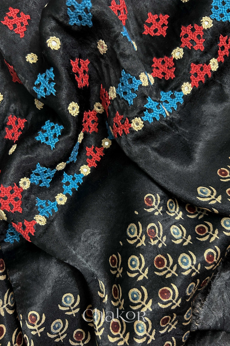 Natural dyed black Ajrakh printed Mashru silk-cotton blouse material with  Traditional Kutch hand embroidery and mirror work.