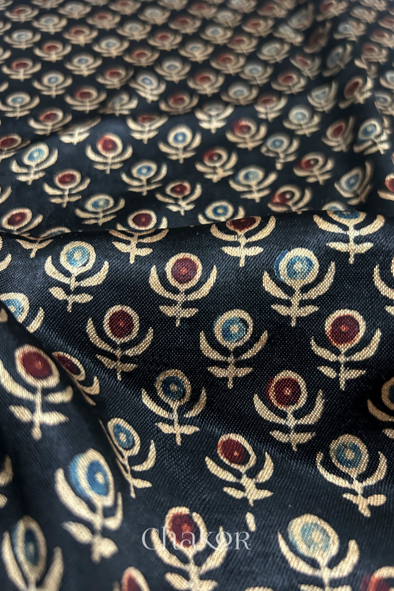 Natural dyed black Ajrakh printed Mashru silk-cotton blouse material with  Traditional Kutch hand embroidery and mirror work for sleeves.