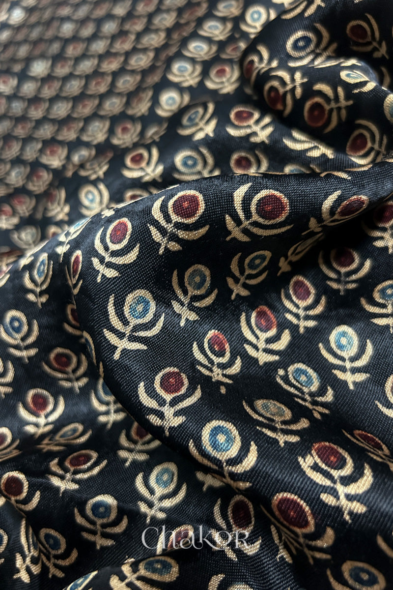 Natural dyed black Ajrakh printed Mashru silk-cotton blouse material with  Traditional Kutch hand embroidery and mirror work for sleeves.