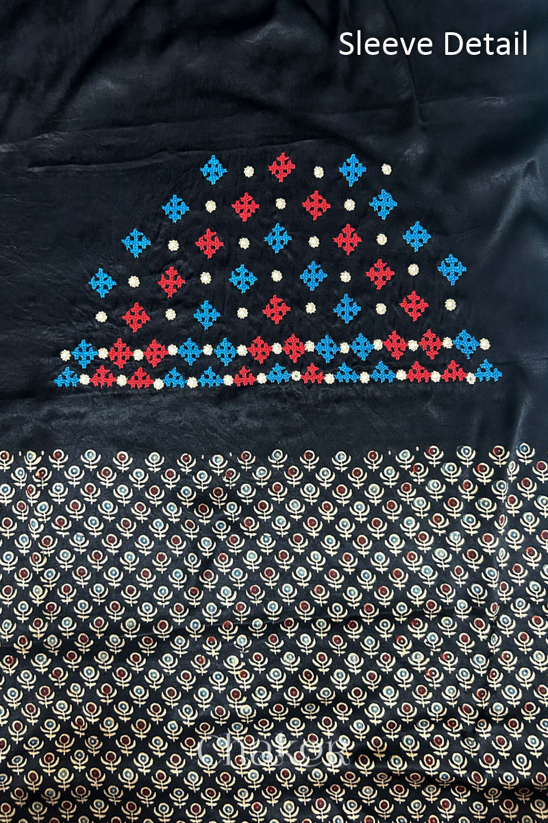Natural dyed black Ajrakh printed Mashru silk-cotton blouse material with  Traditional Kutch hand embroidery and mirror work for sleeves.