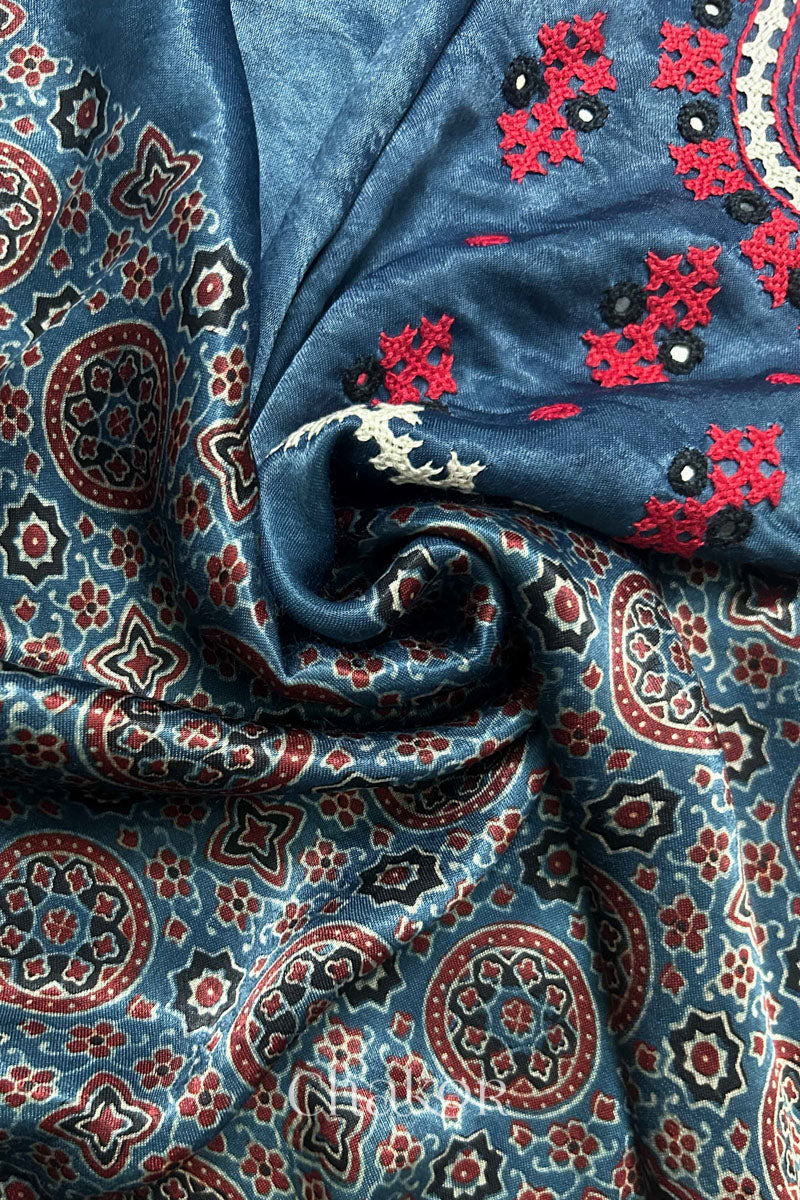 Natural dyed indigo Ajrakh printed Mashru silk-cotton blouse material with  Traditional Kutch hand embroidery and mirror work for sleeves.