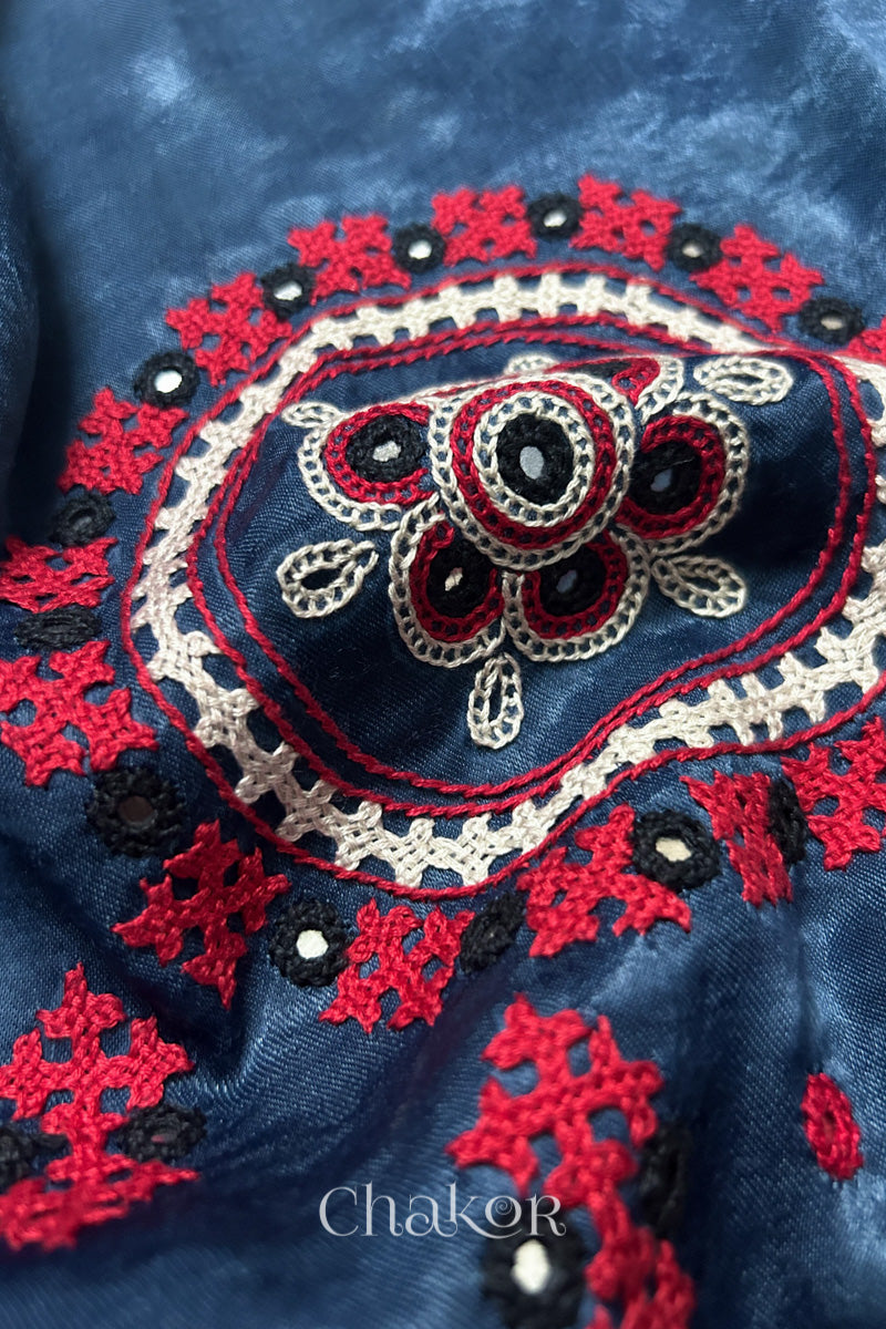 Natural dyed indigo Ajrakh printed Mashru silk-cotton blouse material with  Traditional Kutch hand embroidery and mirror work for sleeves.