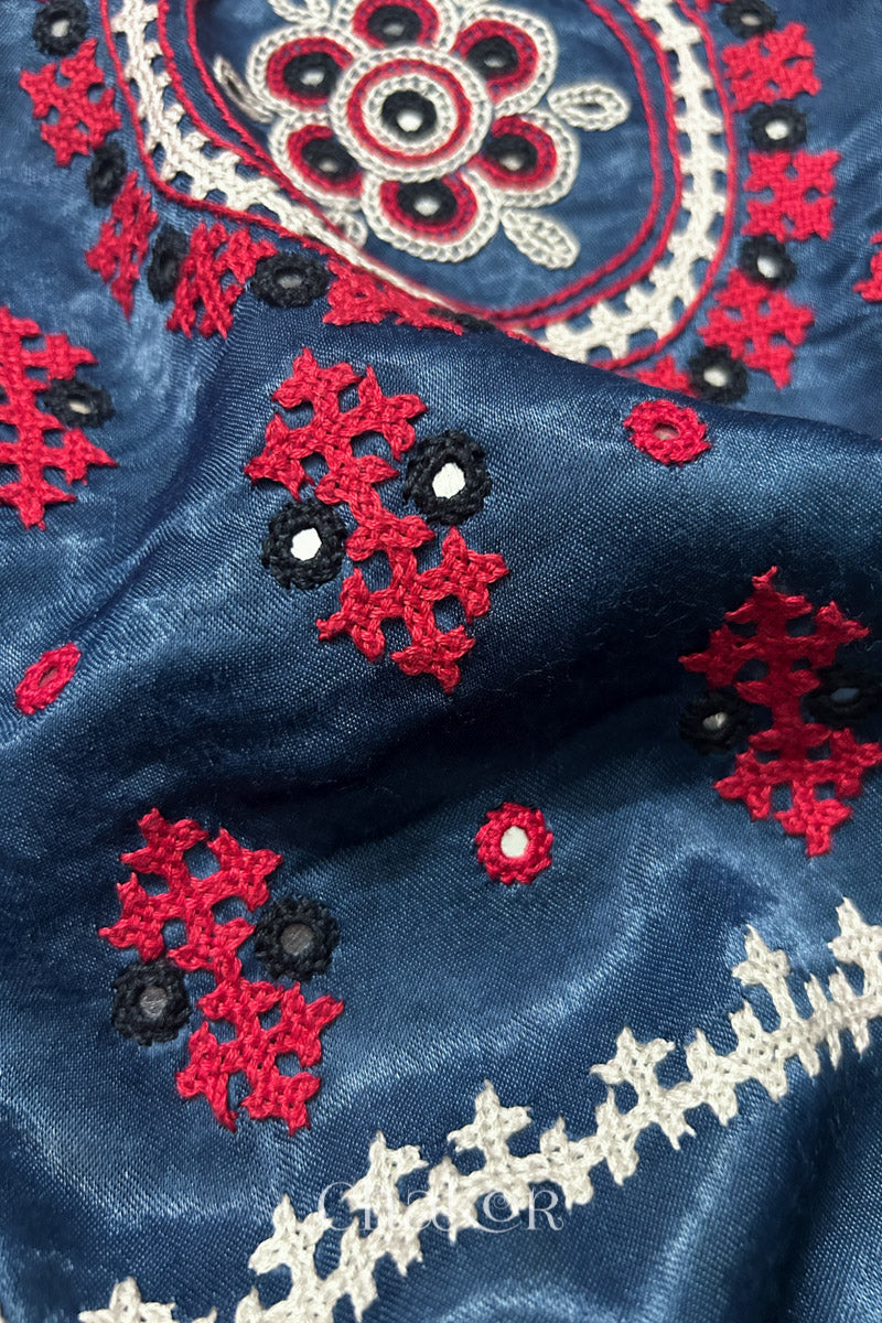 Natural dyed indigo Ajrakh printed Mashru silk-cotton blouse material with  Traditional Kutch hand embroidery and mirror work for sleeves.