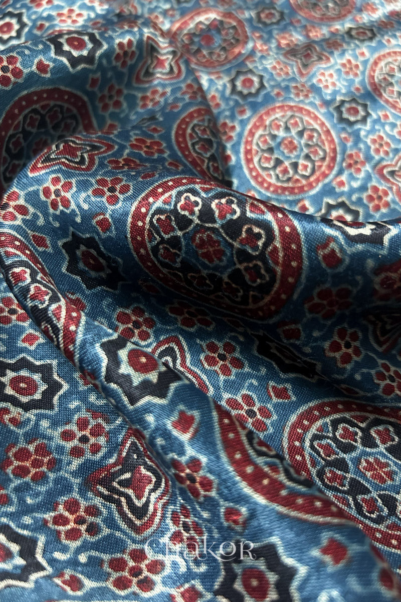 Natural dyed indigo Ajrakh printed Mashru silk-cotton blouse material with  Traditional Kutch hand embroidery and mirror work for sleeves.