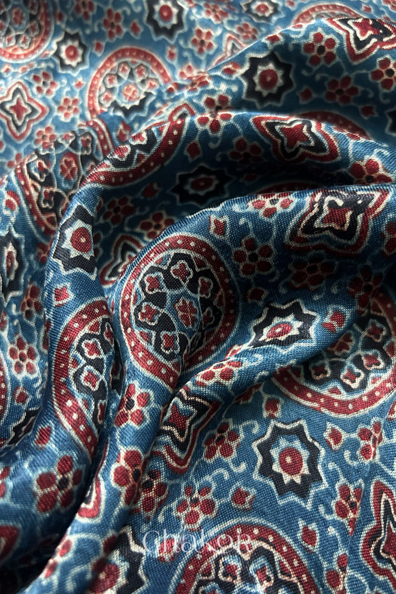 Natural dyed indigo Ajrakh printed Mashru silk-cotton blouse material with  Traditional Kutch hand embroidery and mirror work for sleeves.