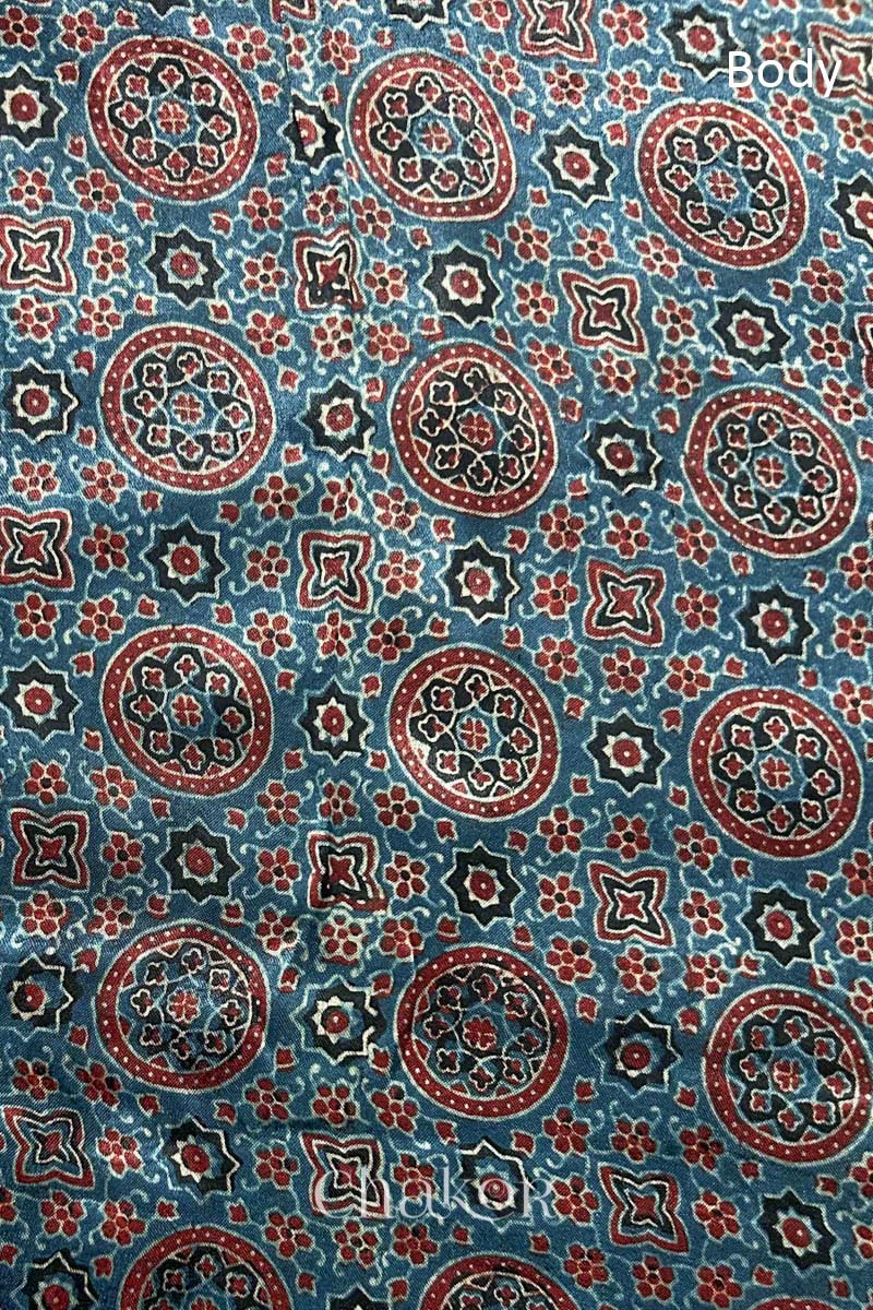 Natural dyed indigo Ajrakh printed Mashru silk-cotton blouse material with  Traditional Kutch hand embroidery and mirror work for sleeves.