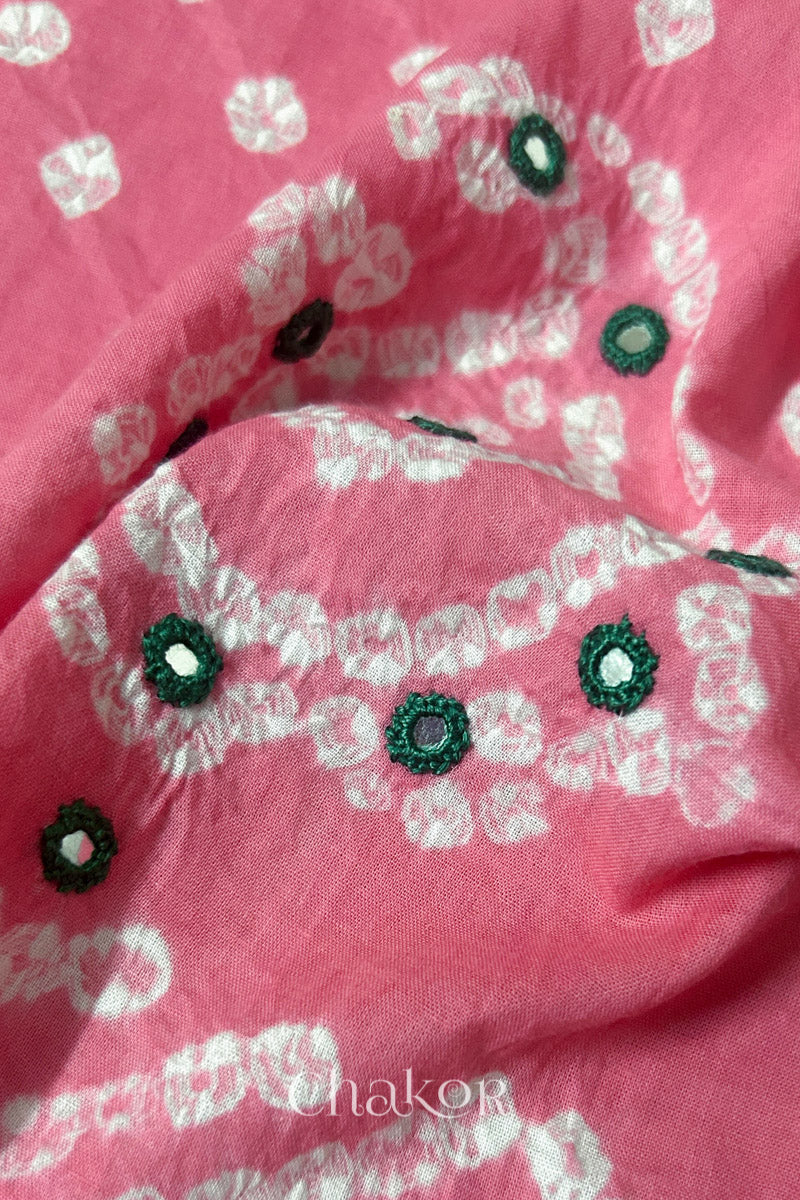 Close-up of Pink Kutch Bandhani blouse fabric showing Keri motifs and hand-embroidered mirror work.

