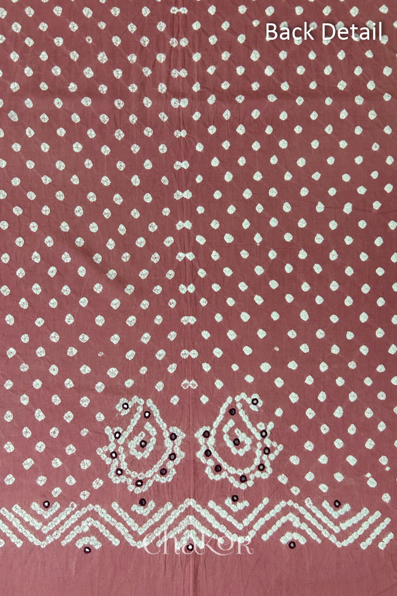Close-up of Old Rose Kutch Bandhani fabric with white dotted pattern and Keri motifs for back.
