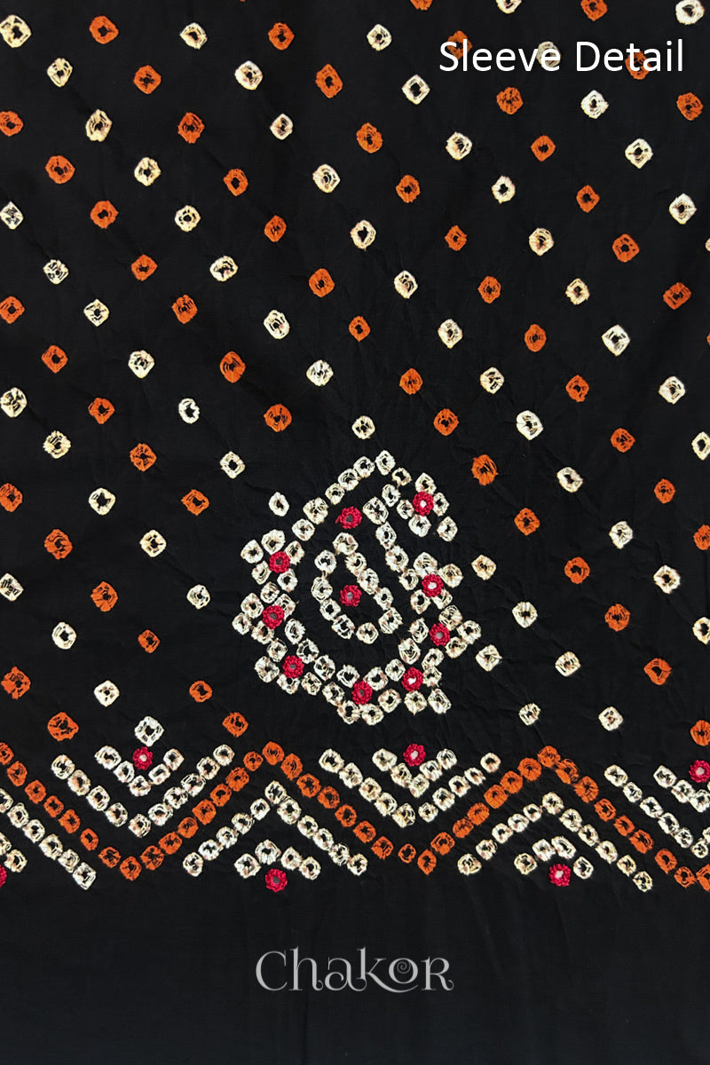 Black Kutch Bandhani cotton fabric with white tie-dye dots and Keri motif detail for sleeves.
