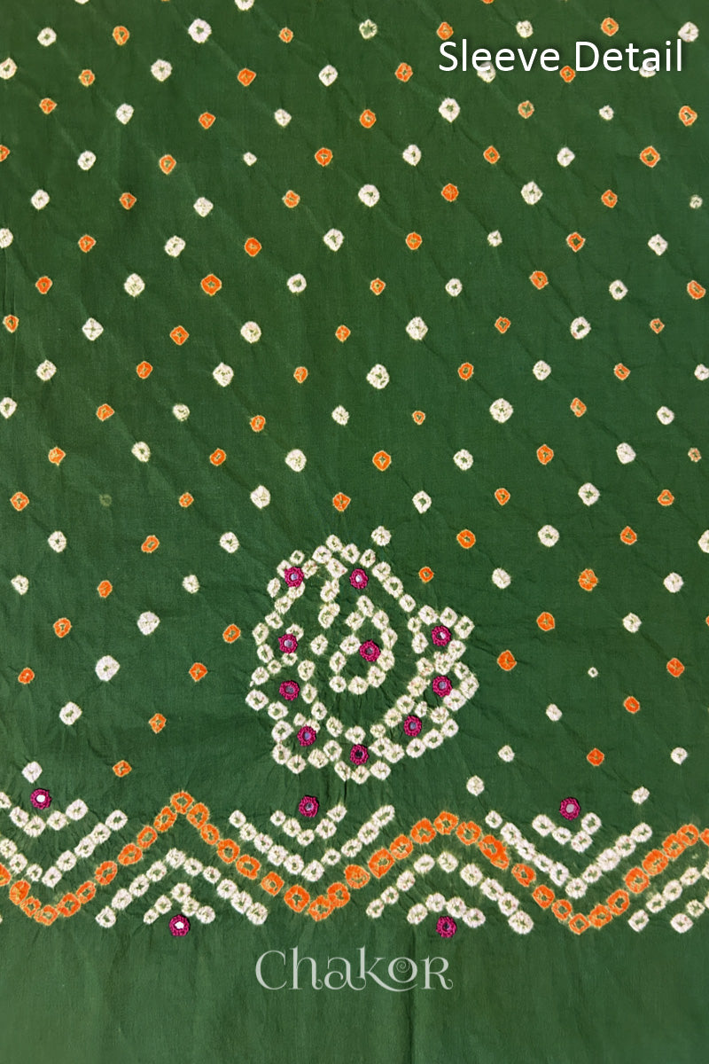 Mehendi Green Kutch Bandhani cotton fabric with white tie-dye dots and Keri motif detail for sleeves.

