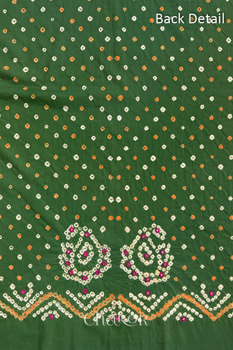 Close-up of Mehendi Green Kutch Bandhani fabric with white dotted pattern and Keri motifs for back.
