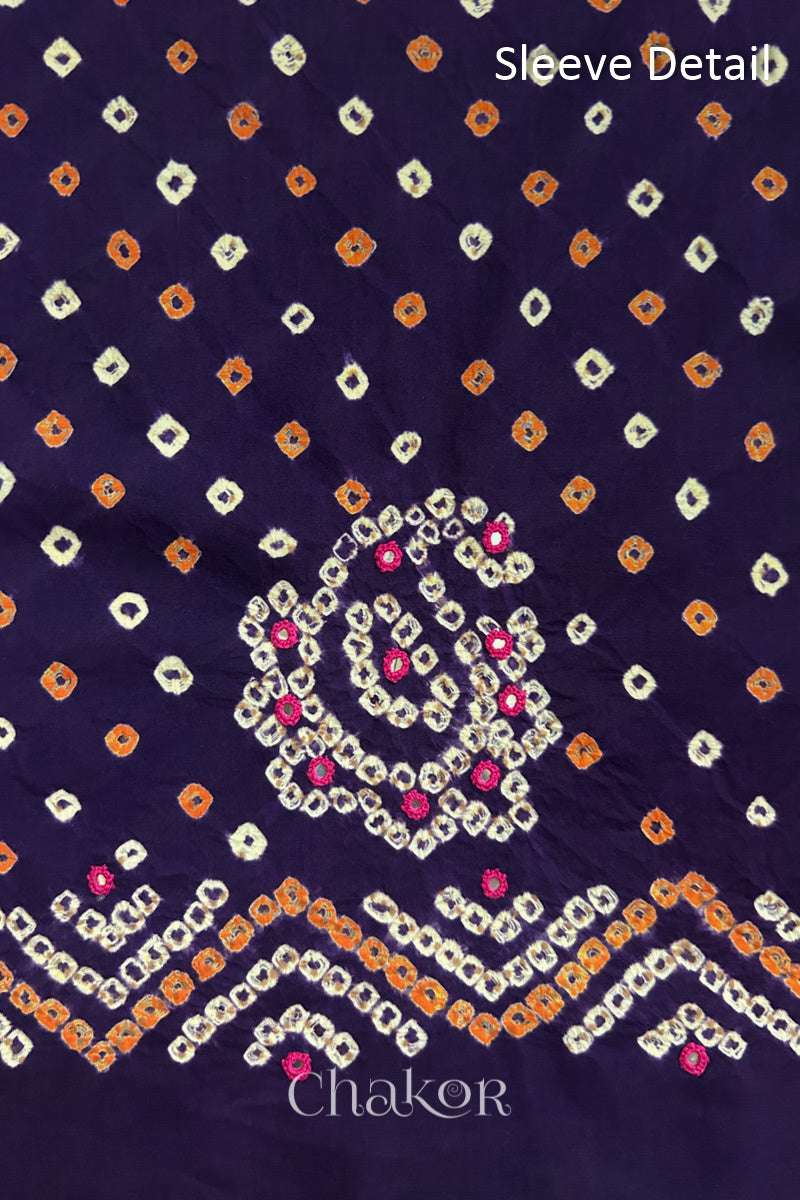 Purple Kutch Bandhani cotton fabric with white tie-dye dots and Keri motif detail for sleeves.
