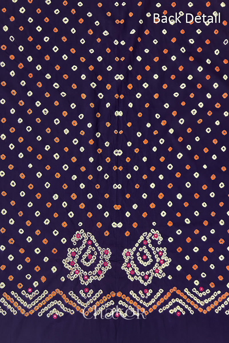 Close-up of Purple Kutch Bandhani fabric with white dotted pattern and Keri motifs for back.

