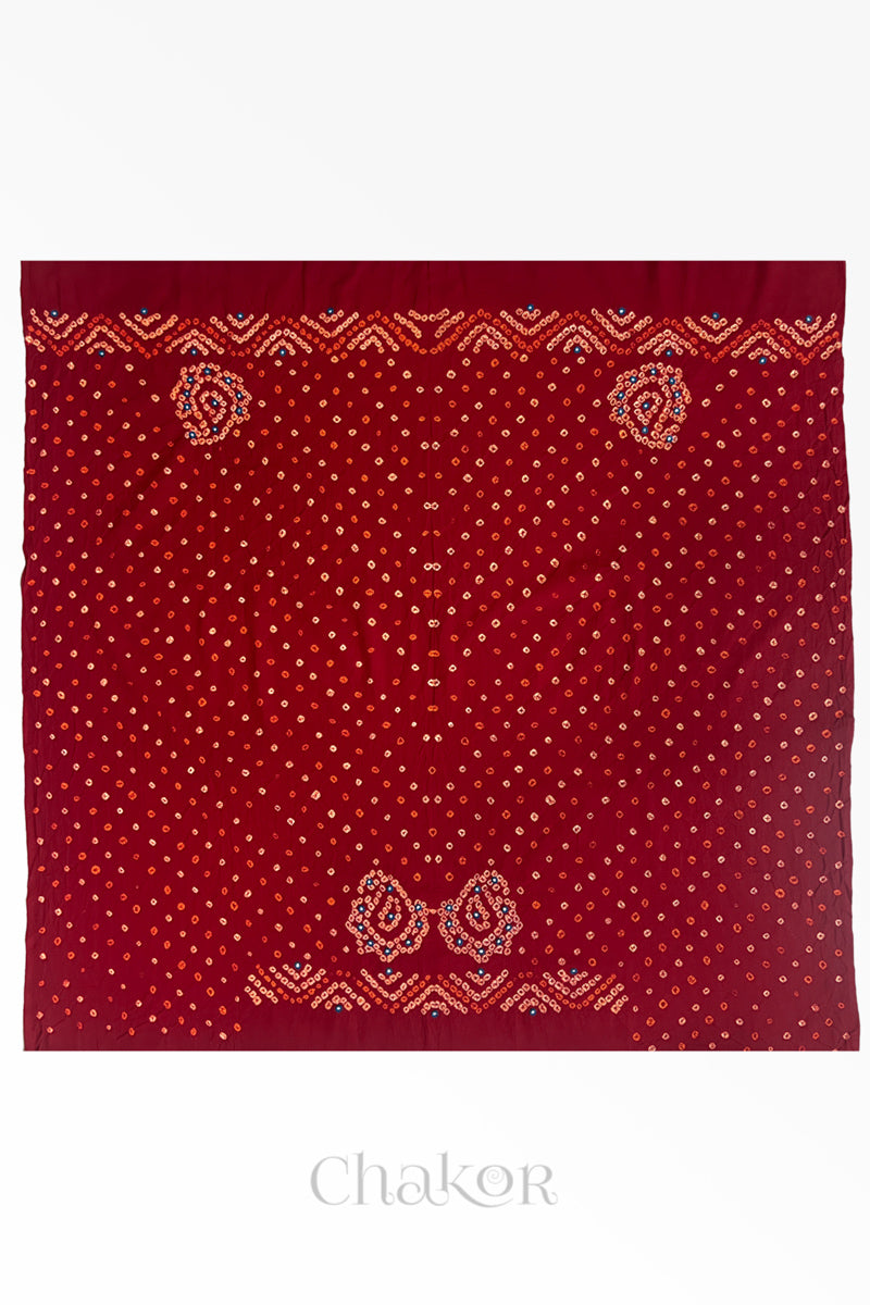 Full 1-metre layout Red Kutch Bandhani cotton blouse fabric showing traditional hand tie-dye pattern.
