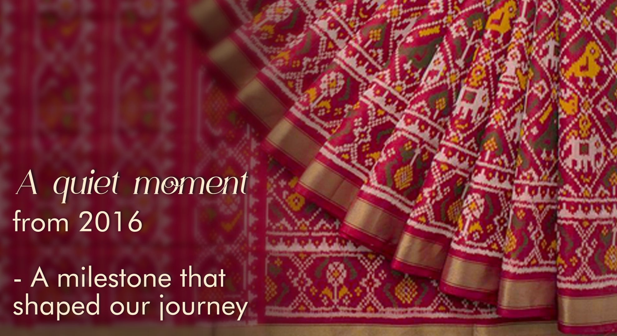 Traditional patola saree with intricate patterns and text overlay on a dark background