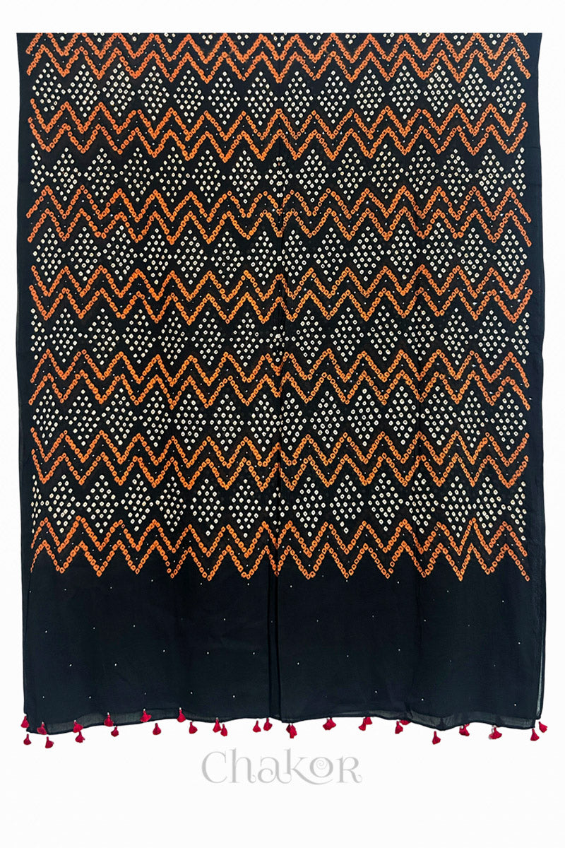 Full view of Black Kutch Bandhani dupatta with mukaish embroidery in pure mercerised mulmul cotton.
