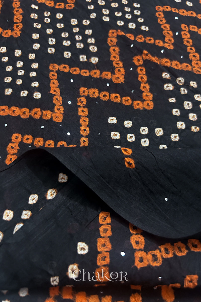 Soft mercerised mulmul cotton texture with authentic Bandhani tie dye work.
