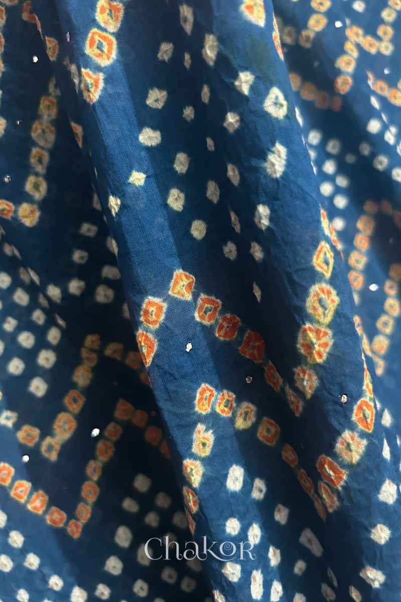 Soft mercerised mulmul cotton texture with authentic Bandhani tie dye work.
