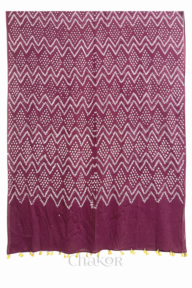Plum pink Kutch Bandhani dupatta with mukaish embroidery in lightweight mercerised mulmul cotton with flowing drape.
