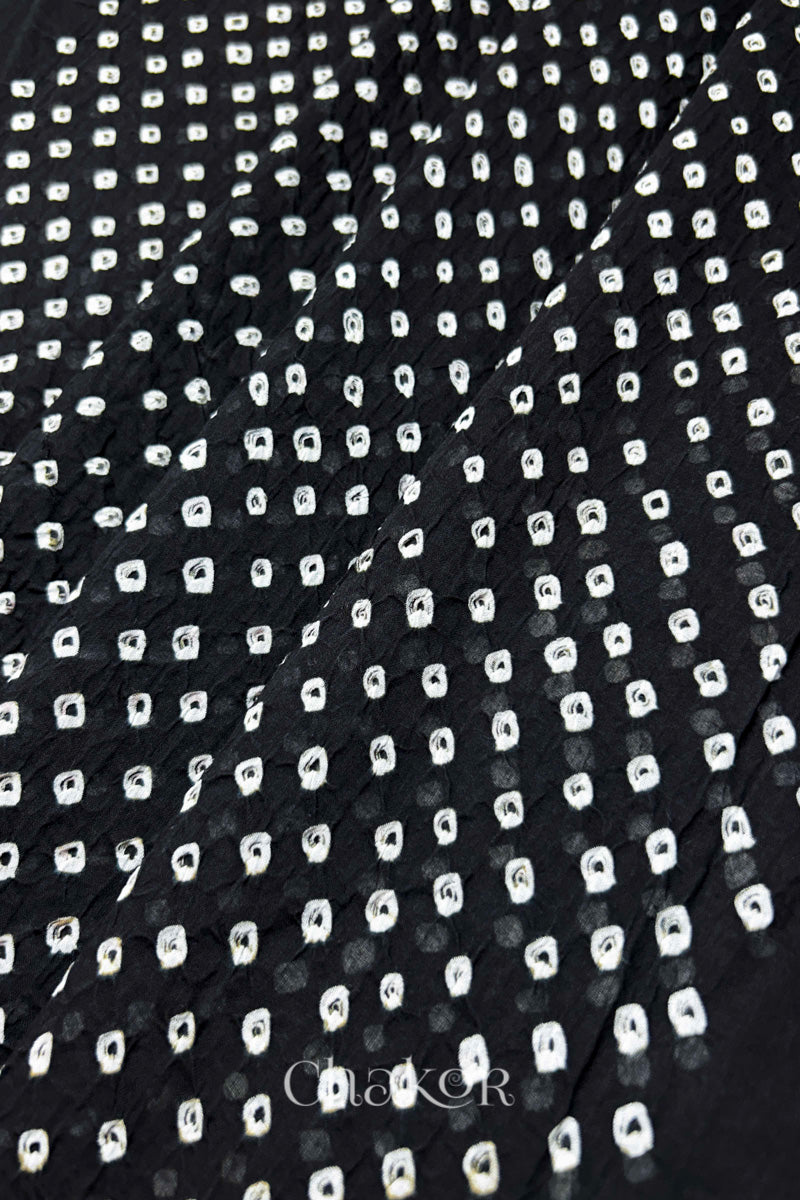 Close-up of Black Bandhani tie-dye dot pattern on mul cotton dupatta.