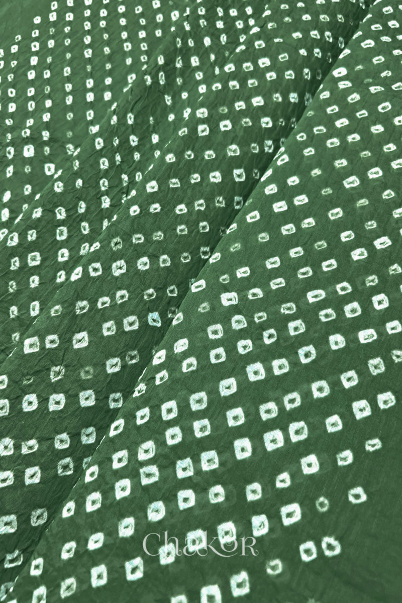 Close-up of Moss green Bandhani tie-dye dot pattern on mul cotton dupatta.