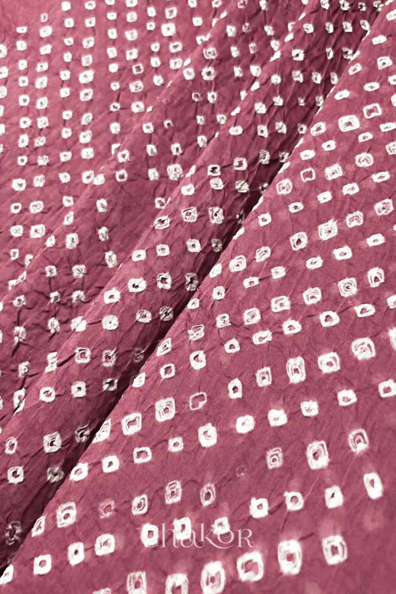 Close-up of Old rose Bandhani tie-dye dot pattern on mul cotton dupatta.