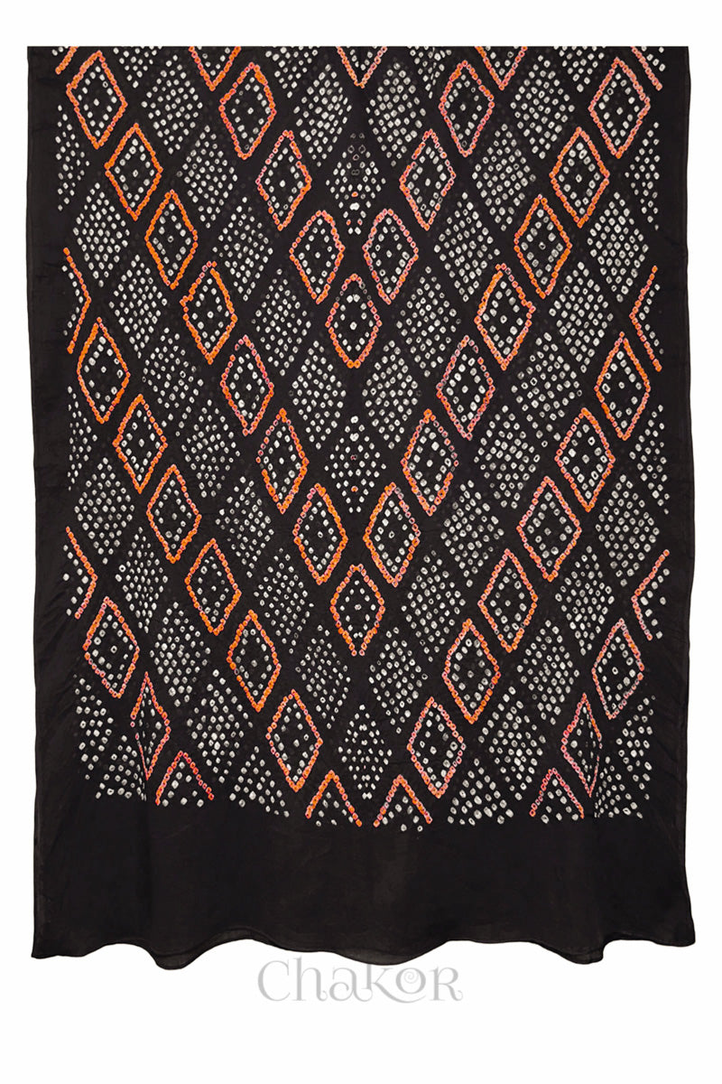 Full view of Black handmade Bandhani dupatta in mercerised mulmul cotton.
