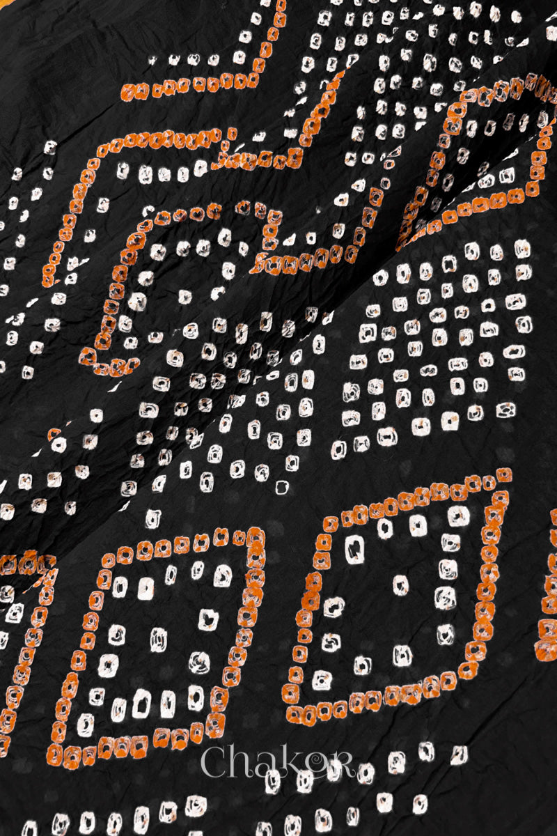 Traditional Chorkat Bandhani pattern with dense hand tied dots on Black cotton mulmul dupatta.
