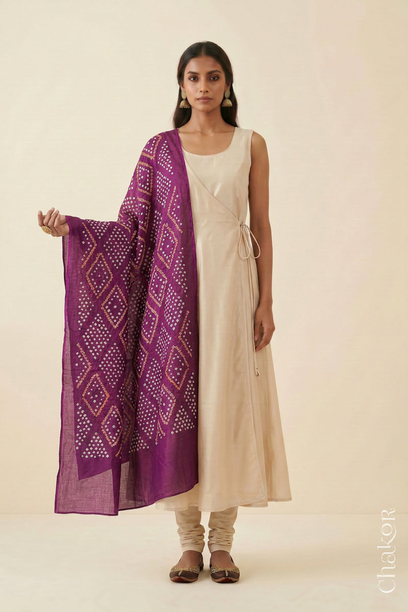 Full view of Magenta handmade Bandhani dupatta in mercerised mulmul cotton.
